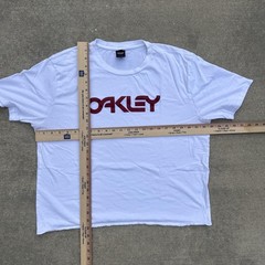 Boxy Oakley white spellout t-shirt with red text logo