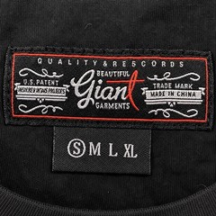 Beautiful Giant Garments black pocket tee with colorful woven/tribal pocket