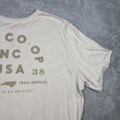 REI CO-OP flower graphic tan T shirt 1938 NC Outfitting the Old North State