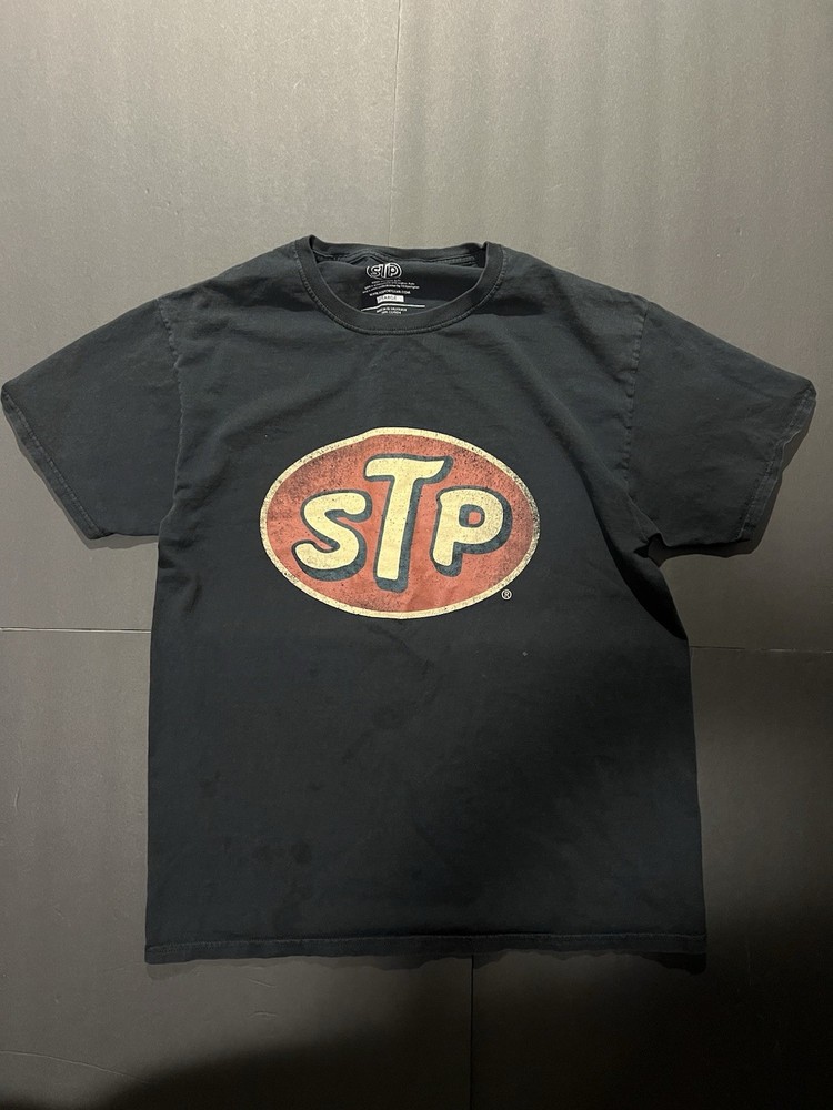 Y2K STP black cotton t-shirt Size L has a kilt stain as shown in last slide