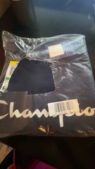 Three champion T-shirts, and one pair of socks