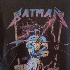 This black Batman t-shirt features a graphic inspired by the Metallica band logo