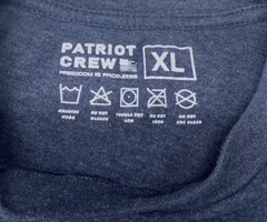Two Men’s Patriot Crew T-Shirts Black & Blue Short Sleeve XL Logo Front & Back