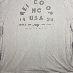REI CO-OP flower graphic tan T shirt 1938 NC Outfitting the Old North State