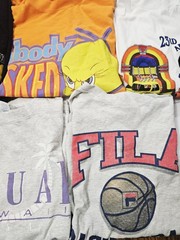 Vintage Lot Of 8 T-shirts Various Sizes Looney Tunes, NFL, Garfield, Ect.