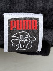 Puma x Lance Wyman Men’s Tee Shirt MEDIUM Power Through Peace Defenition Graphic