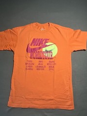 NIKE Small Orange T Shirt World Tour (Small Stain In the Back)