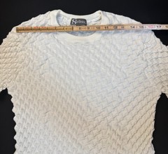 Silversilk textured knit with a raised geometric pattern; white XX (slim)