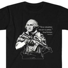 Stay Strapped Or Get Clapped – George Washington – T-Shirt