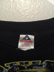 Vintage 2000 (WWF) t-shirt Of Dwayne “The Rock” Johnson on a black cotton tee.