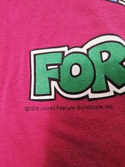 Vintage Lot Of 8 T-shirts Various Sizes Looney Tunes, NFL, Garfield, Ect.