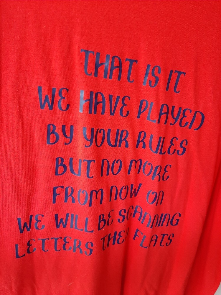 us postal t shirt men’s xl. Red with black letters.
