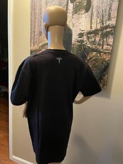 black tesla t shirt, new in bag. Last years uniform shirts. Multiple Sizes.