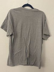 DOM brand graphic tee with the slogan “NOPE – Not gonna happen.”