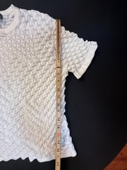 Silversilk textured knit with a raised geometric pattern; white XX (slim)
