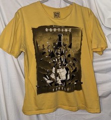 DNMX Graphic Tee Large Yellow “Break the Routine” Bottle Shatter Print Shirt