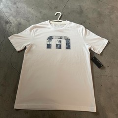 Brand New with tags- Travis Mathew White T-shirt with logo- Size Mens Small