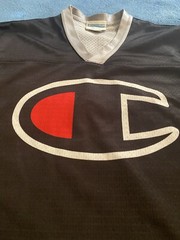 Champion #19 Champion Logo Hockey Jersey Sz L (44) (25in W X 30in L) Black