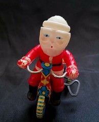 Vintage Suzuki Japan Celluloid Santa Claus on Tin Bike Christmas Wind Up Toy