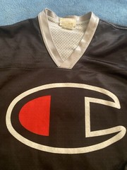 Champion #19 Champion Logo Hockey Jersey Sz L (44) (25in W X 30in L) Black