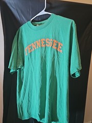 green t-shirt features orange TENNESSEE