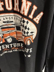 California Tourism T Shirt Size Medium. Black and Orange Long Sleeve Shirt.
