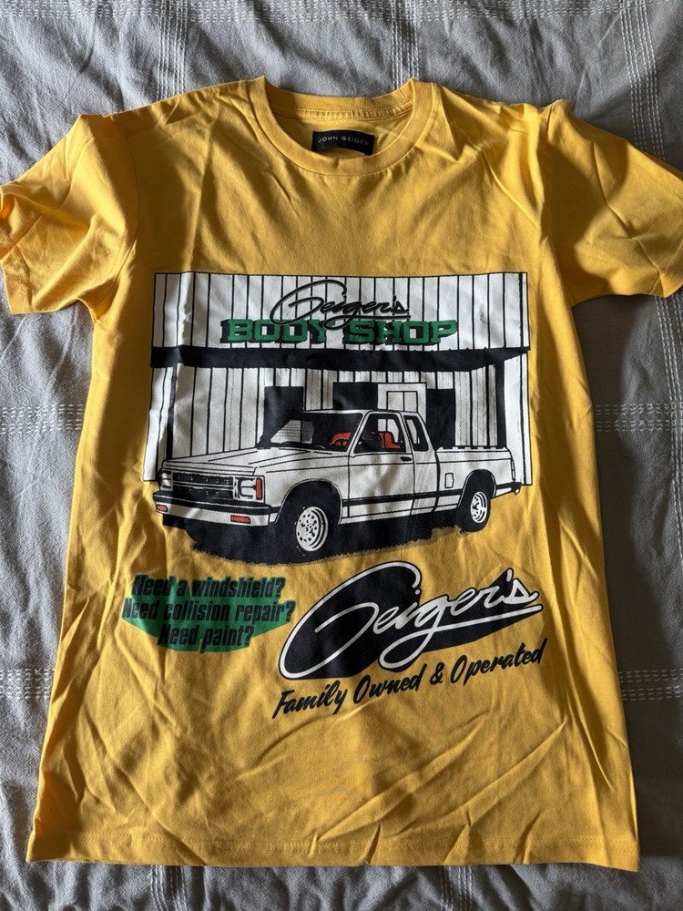 John Geiger Designer Men’s Body Shop T-Shirt, Yellow, Brand New, Never Worn