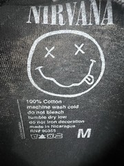 VTG Nirvana Smiley Face Acid Wash T-Shirt Size Medium 90’s Grunge Band Yellow