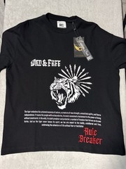 black cotton t-shirt features a bold red embroidered panther graphic Size Small