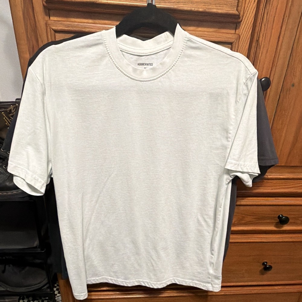 Abbreviated Men’s White Solid Crew Neck Short Sleeve T-Shirt, Size M