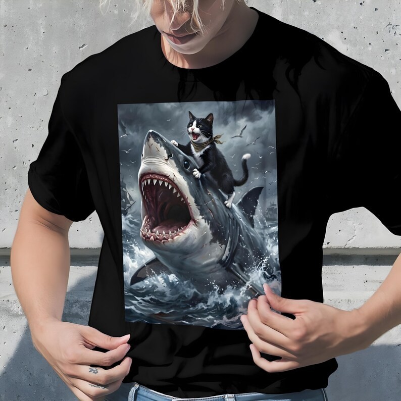 Funny Cat Riding Shark T-Shirt: Cat Lovers Tee