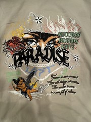 NWT Paradise Lost MIA “Success Breeds Envy” Graphic Tee – Sand / Tan – Size LRG