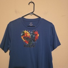 George Blue Graphic Tee – “Different is Beautiful” Size Medium