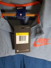 New with tag! Tri tone color Small Nike Polo shirt Blues And Red.