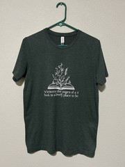 T-shirt “ Between The Pages Of Books Is A Lovely Place To Be “