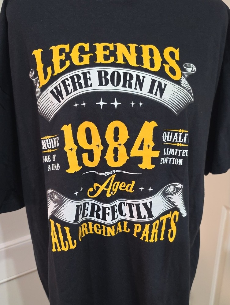 Gildan Black Graphic Tee with Yellow and White 1984 Design – Size XL