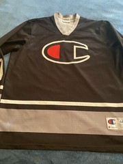 Champion #19 Champion Logo Hockey Jersey Sz L (44) (25in W X 30in L) Black