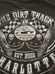 The Dirt Track At Charlotte Tee Shirt Black, White Letters 20in Across 27in Long