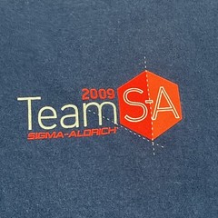 Sigma Aldrich VTG 2009 T-Shirt – 5th Anniversary – Navy Blue Mens 2XL Tee – EUC
