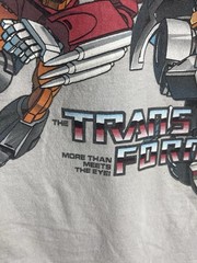 TRANSFORMERS NWT Gen 1 “More Than Meets The Eye” 2009 T-Shirt Men’s Large Gray