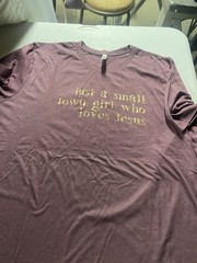 Heather Maroon short sleeve t-shirt with Gold “Just a Small Town Girl …” logo