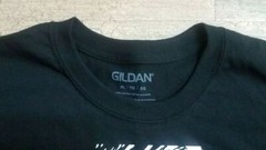 Banned Galvin Mcinnes T-Shirt Size XL Black with Pink Writing. Quote on back.