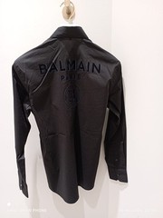 balmain black shirt with front logo and printed written on the back