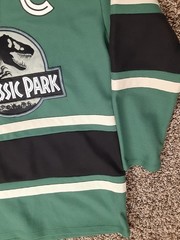 Box Lunch Jurassic Park #93 Captain Lace Up Hockey Jersey Green Adult Small