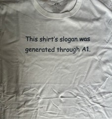 T-Shirt funny “This shirt’s slogan was generated through A1.” 60% cotton 40% pol