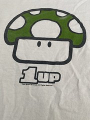 1up mushroom shirt mario promo from 2004 with visible stains as shown