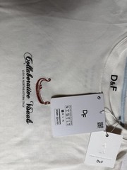 New shirt with label with print on the back