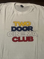 Brand New White Two Door Cinema False Alarm Tour concert shirt. Size M.