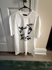 Selling this authentic Louis Vuitton graphic tee