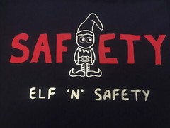 Elf and Safety Christmas T-Shirt Funny Gift Secret Santa Gift Health Manager Tee